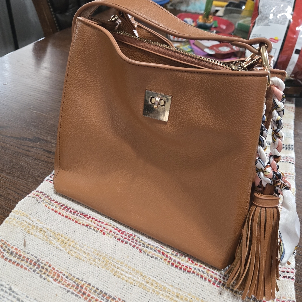Elegant Tan Leather Handbag with Tassel